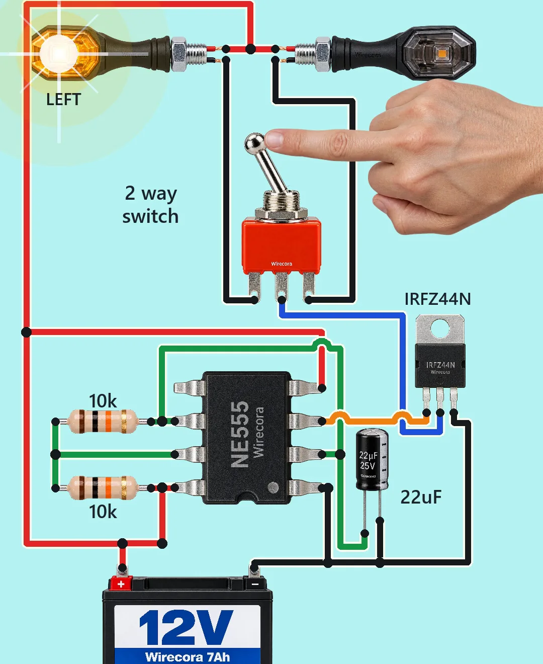 Two motorcycle turn-signal lamps, a 2 way toggle switch, an NE555 with two 10k resistors and a 22 uF capacitor, an IRFZ44N and a 12 V motorcycle battery